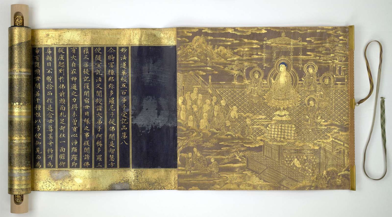 A-rare-copy-of-the-Lotus-Sutra-in-a-lavishly-decorated-scroll-with-gold-and-silver-ink.-Japan-c.-1636